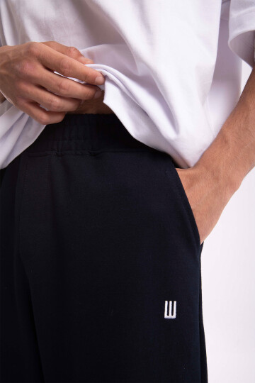 Flaw Atelier Logo Embroidered Adjustable Leg Sweatpants AR